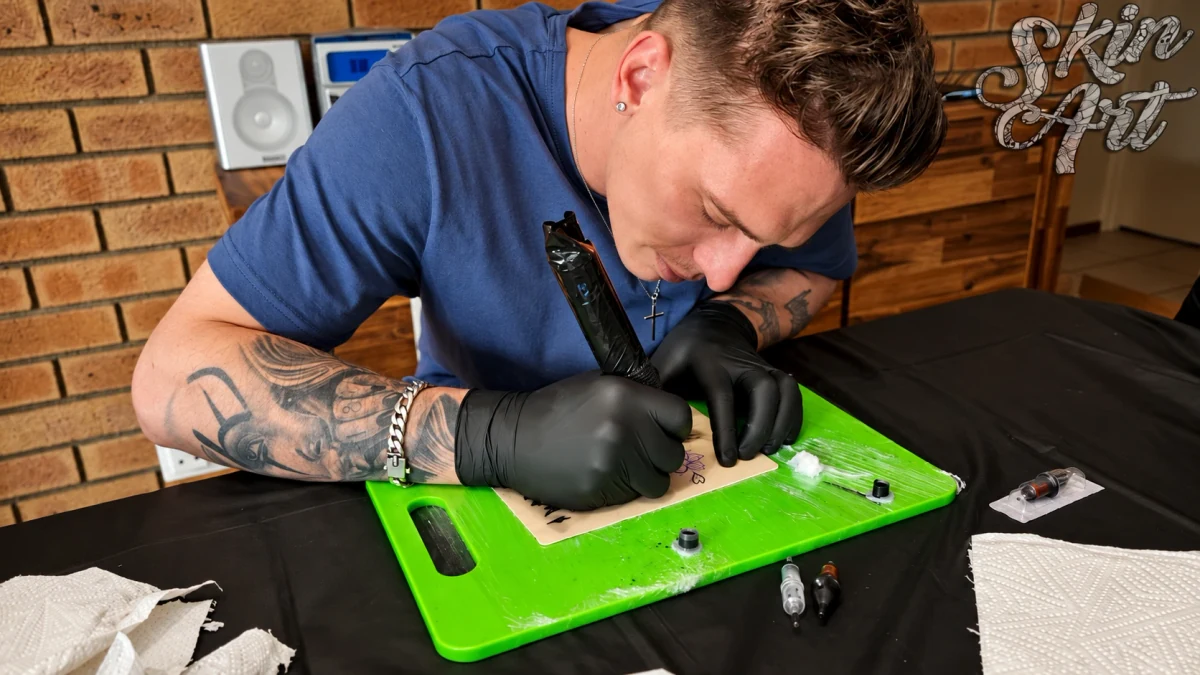 Tattoo machine demonstration for the Skinart online tattoo course